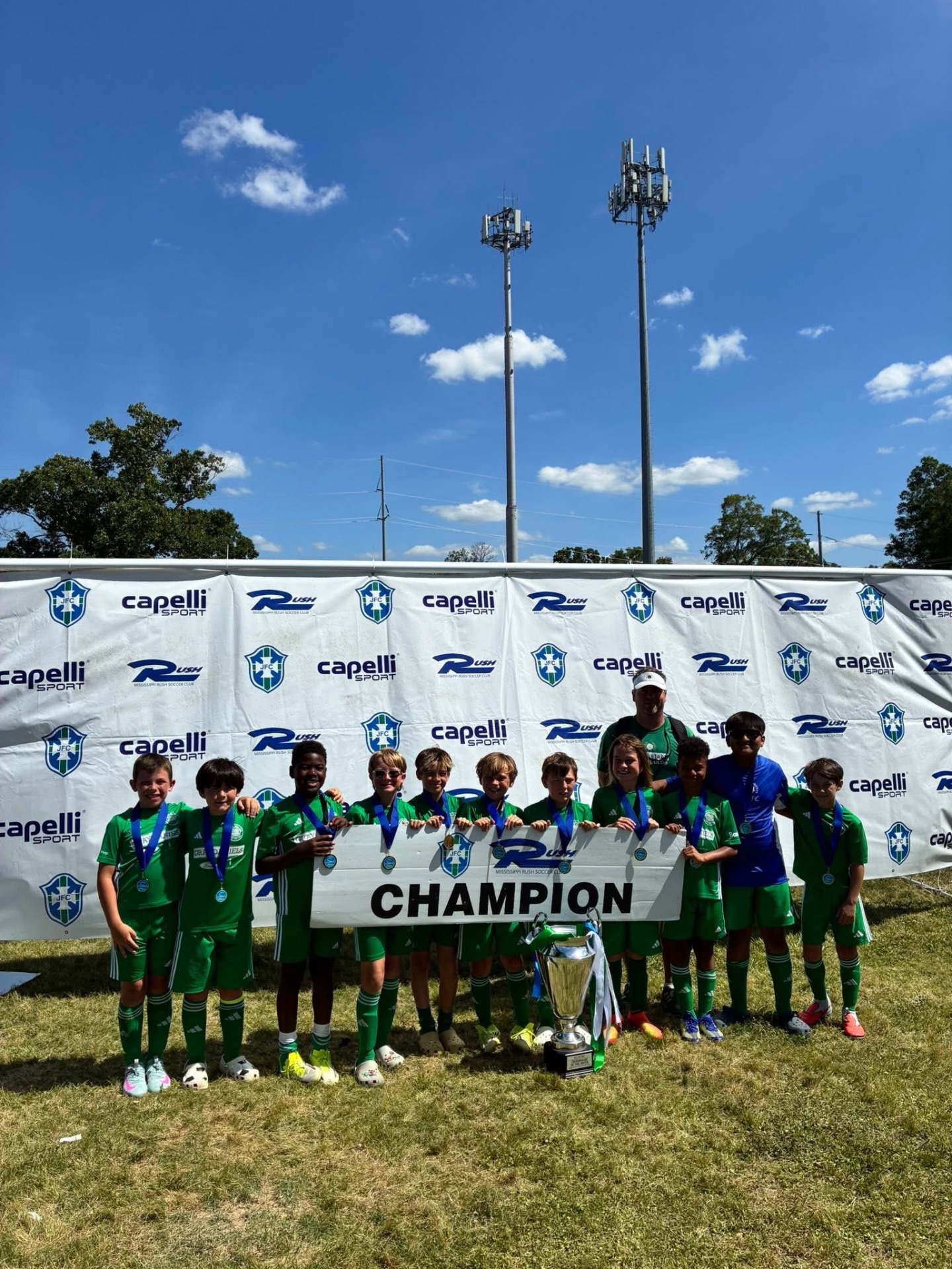 GFC boys champions with trophy and medals
