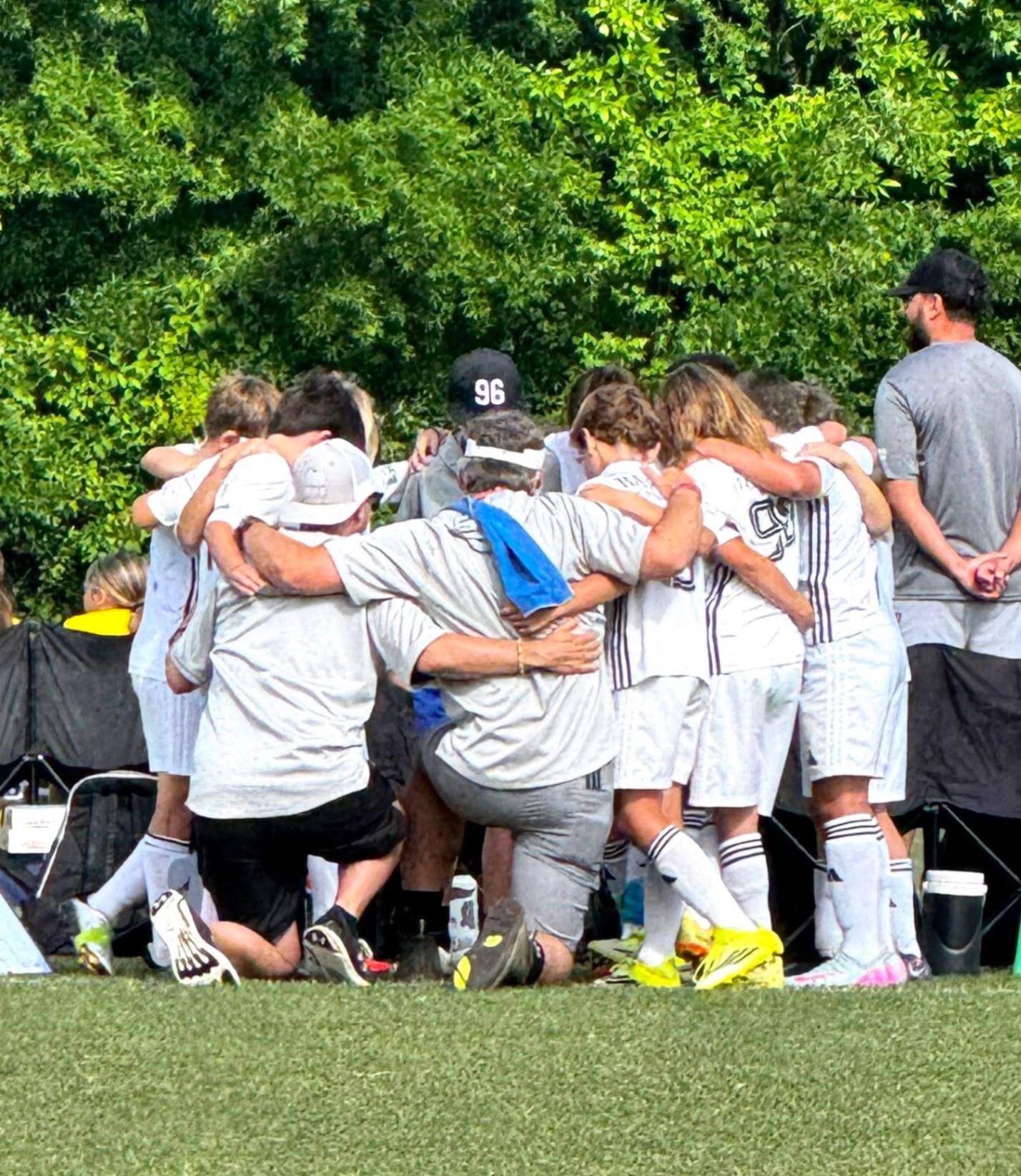 Team huddle on the sideline
