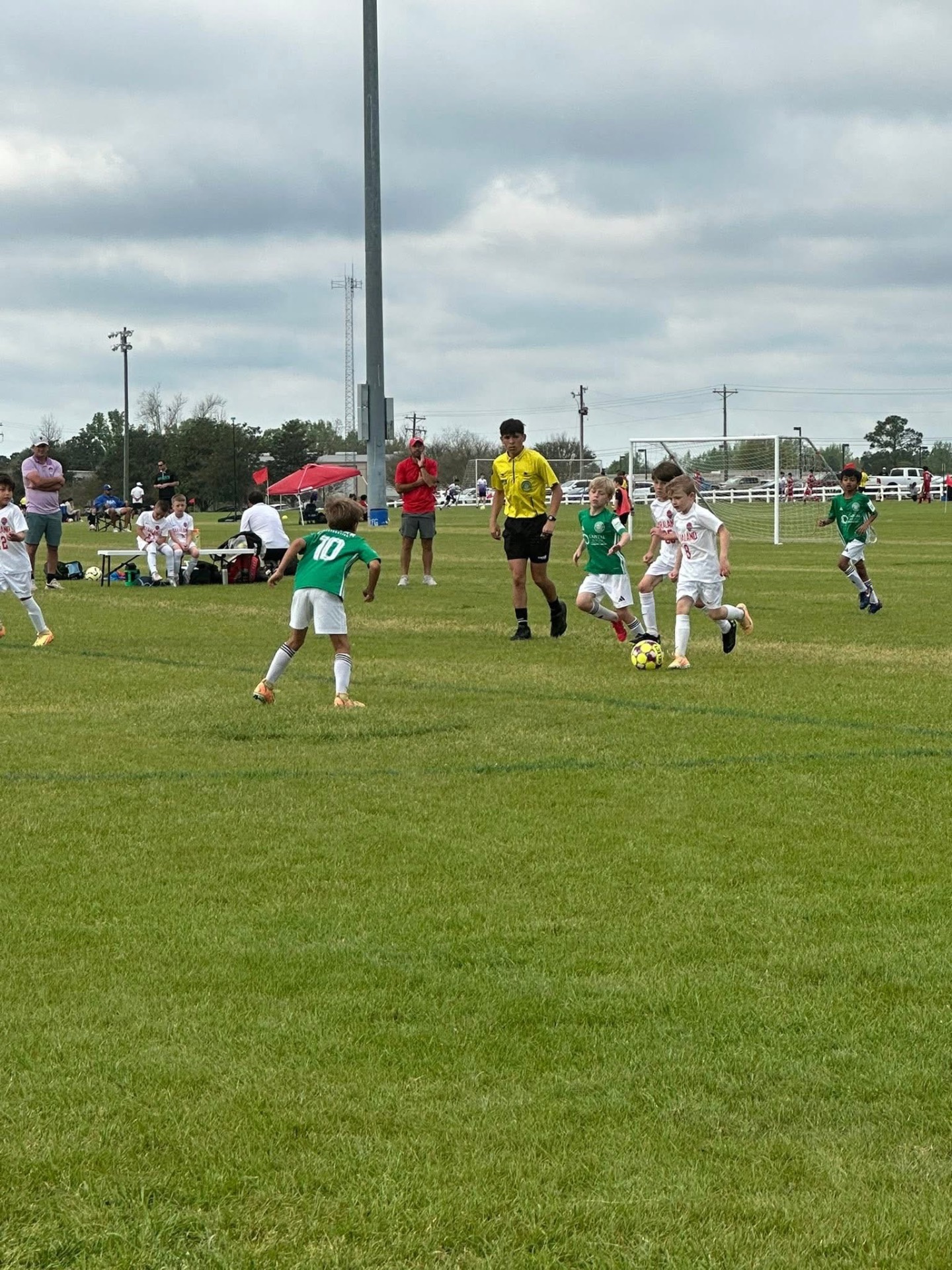 GFC player driving the ball upfield in match